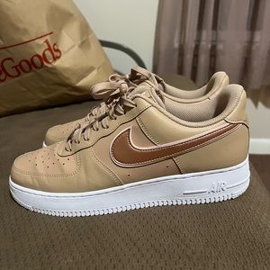 Nike Air Force 1 womens size 12 fits a mens 10.5 tan color